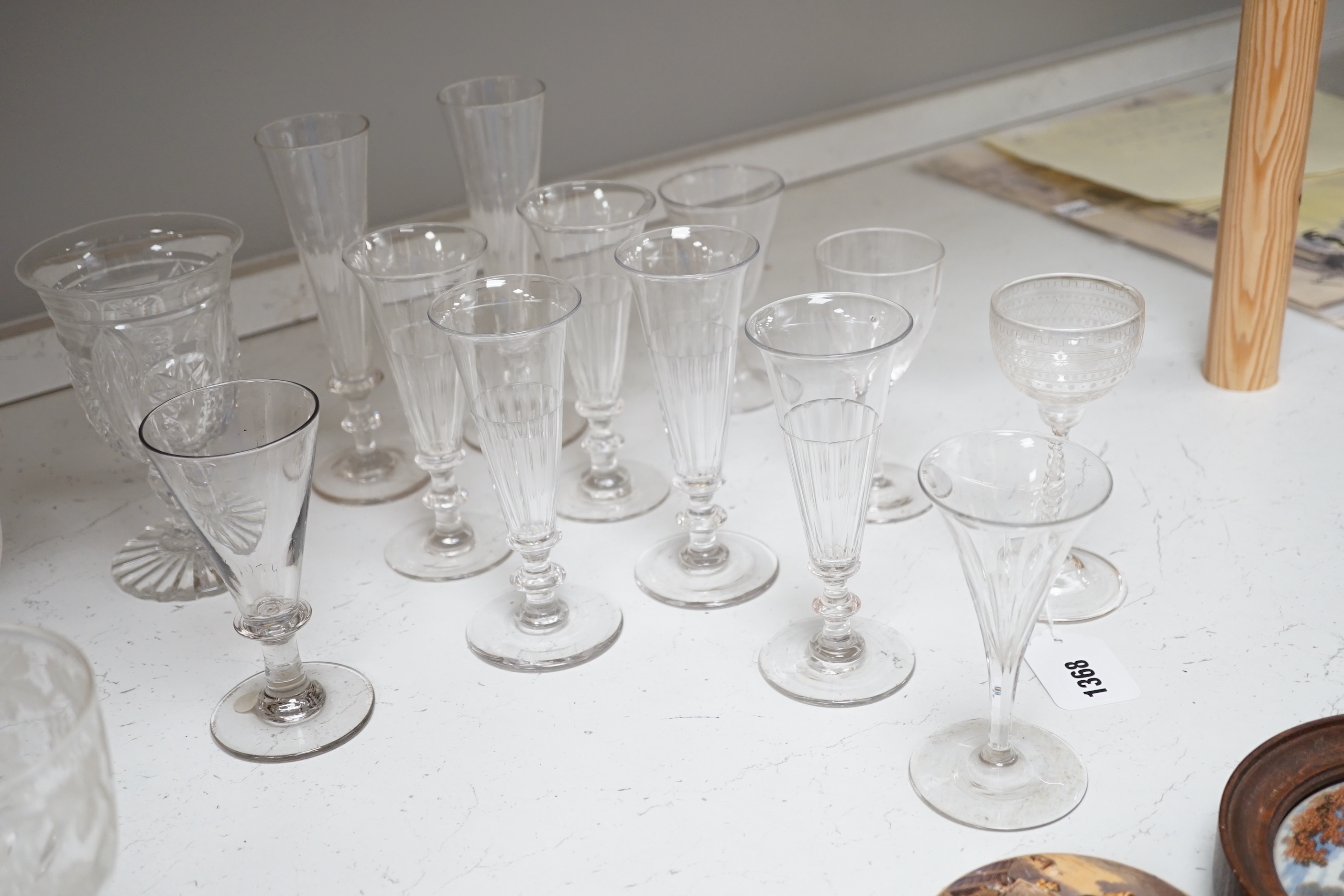 A group of Regency to Edwardian cut drinking glasses, decanters etc including rummers